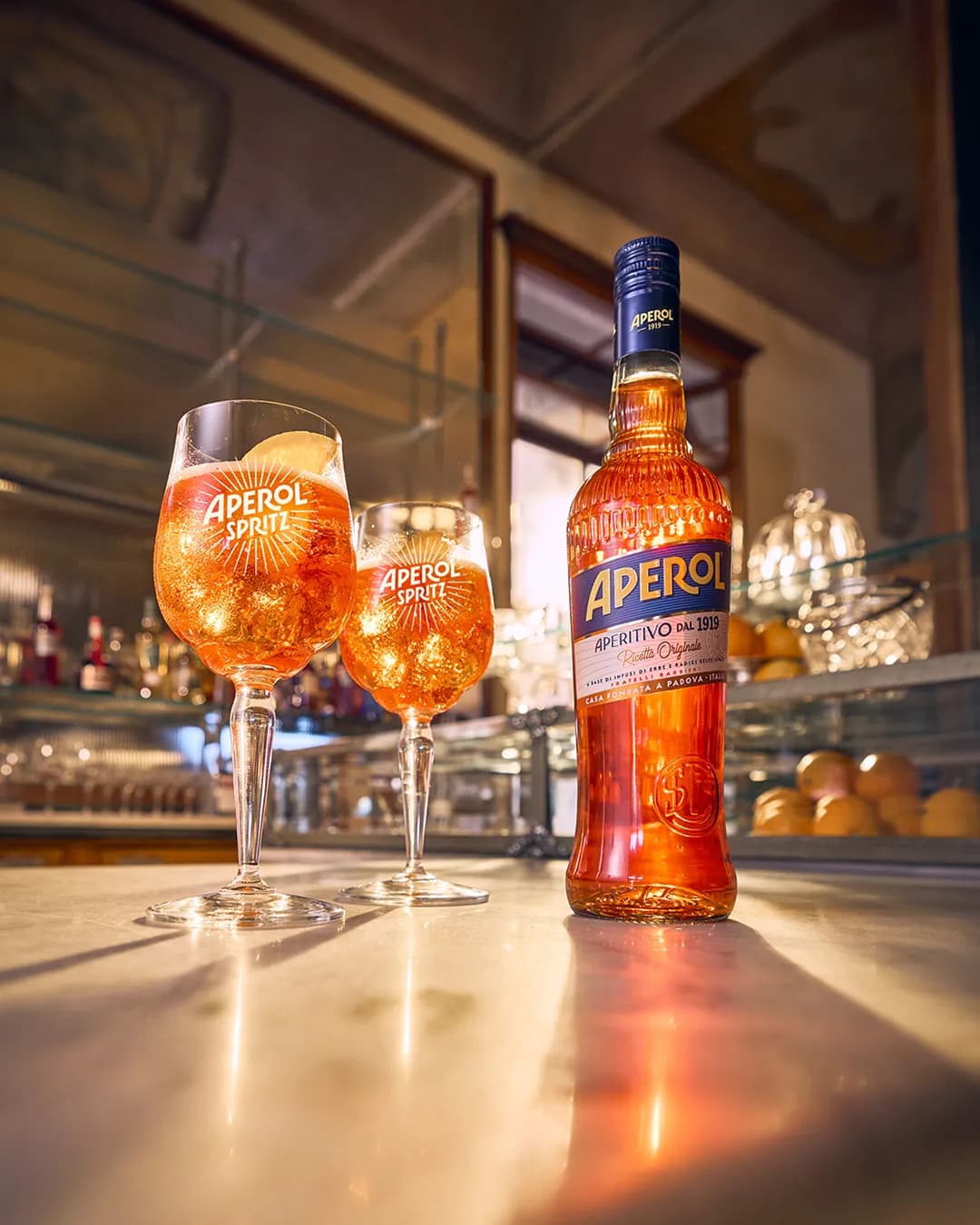 Aperol bottle with glasses